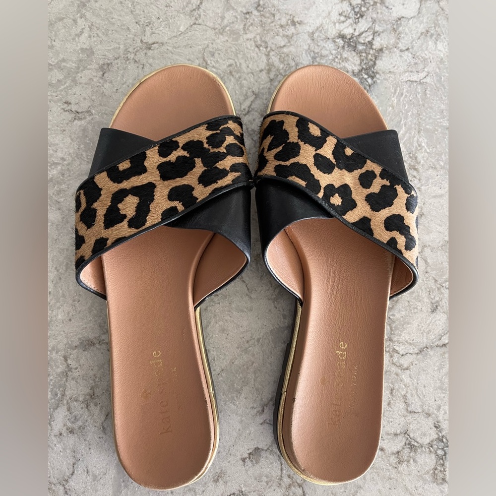 Kate Spade leather and pony hair sandals.  They are in fabulous condition.